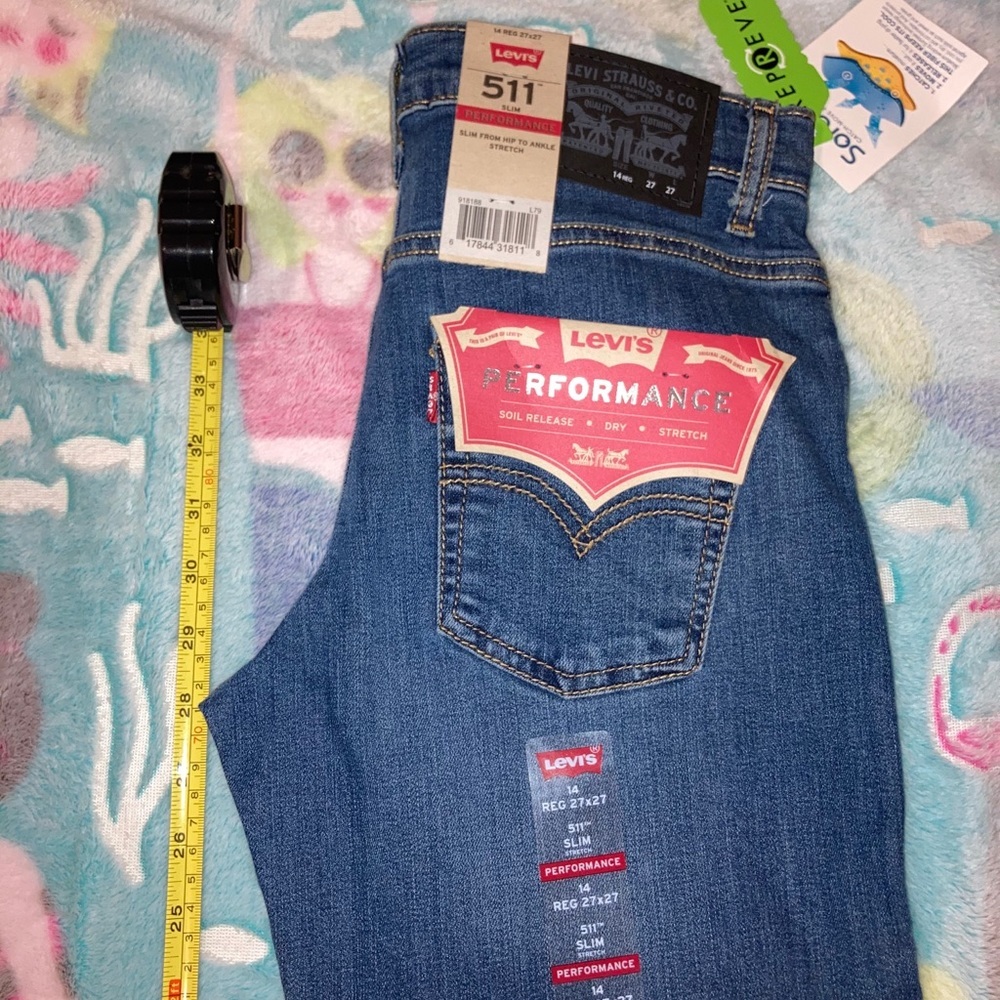 Levi’s Performance 511 Slim Medium Wash Jeans​